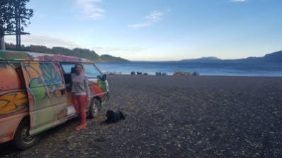 Waking up on the beach in Pucon with one of our many dog friends