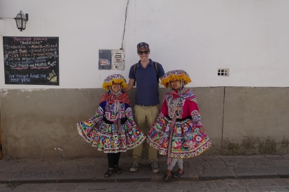 The tourist posing with the locals