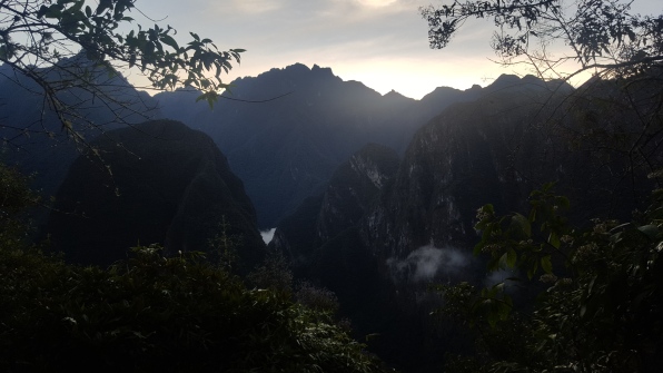 Climbing up to Machu Picchu during sunrise